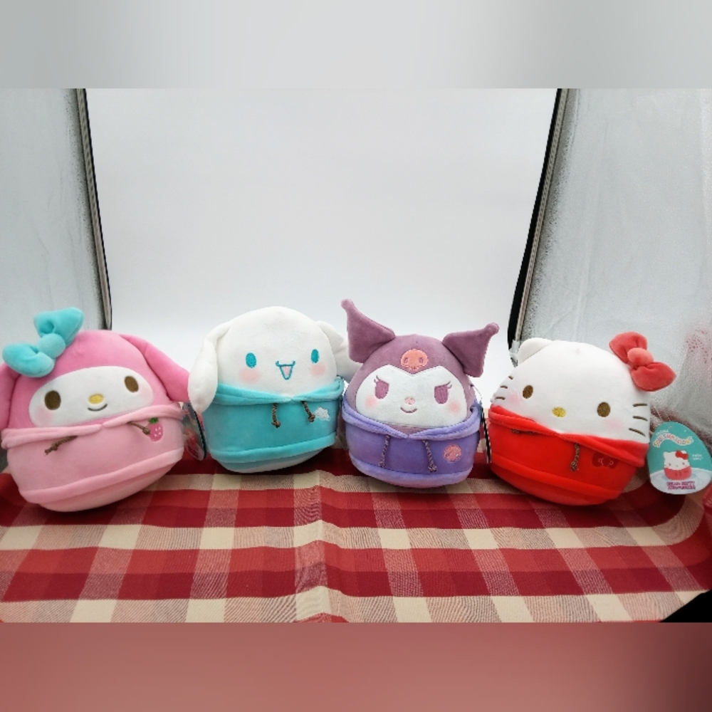 4 Hello Kitty Squishmellows! One Hello Kitty, Melody, Cinnamonroll And Kuromi